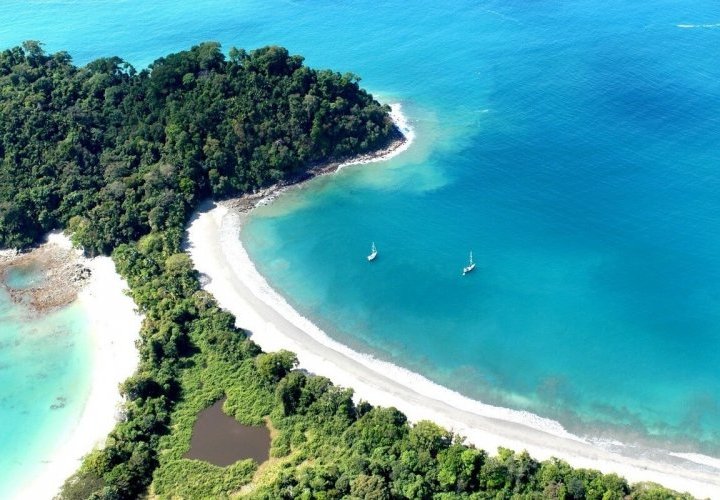Travel to the warm coast of the Central Pacific reaching Manuel Antonio National Park